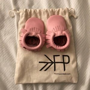 Freshly picked newborn pink moccasins (like new)